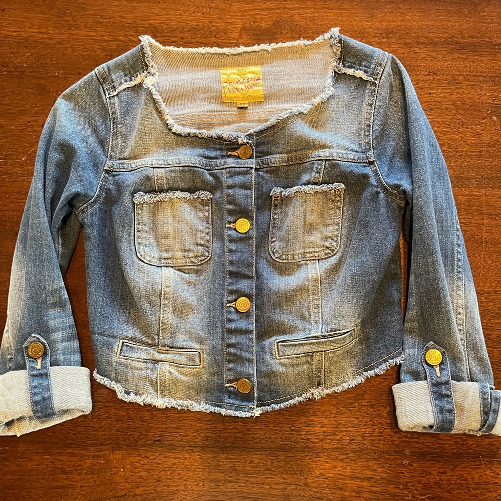Princess Vera Wang cropped denim jacket.